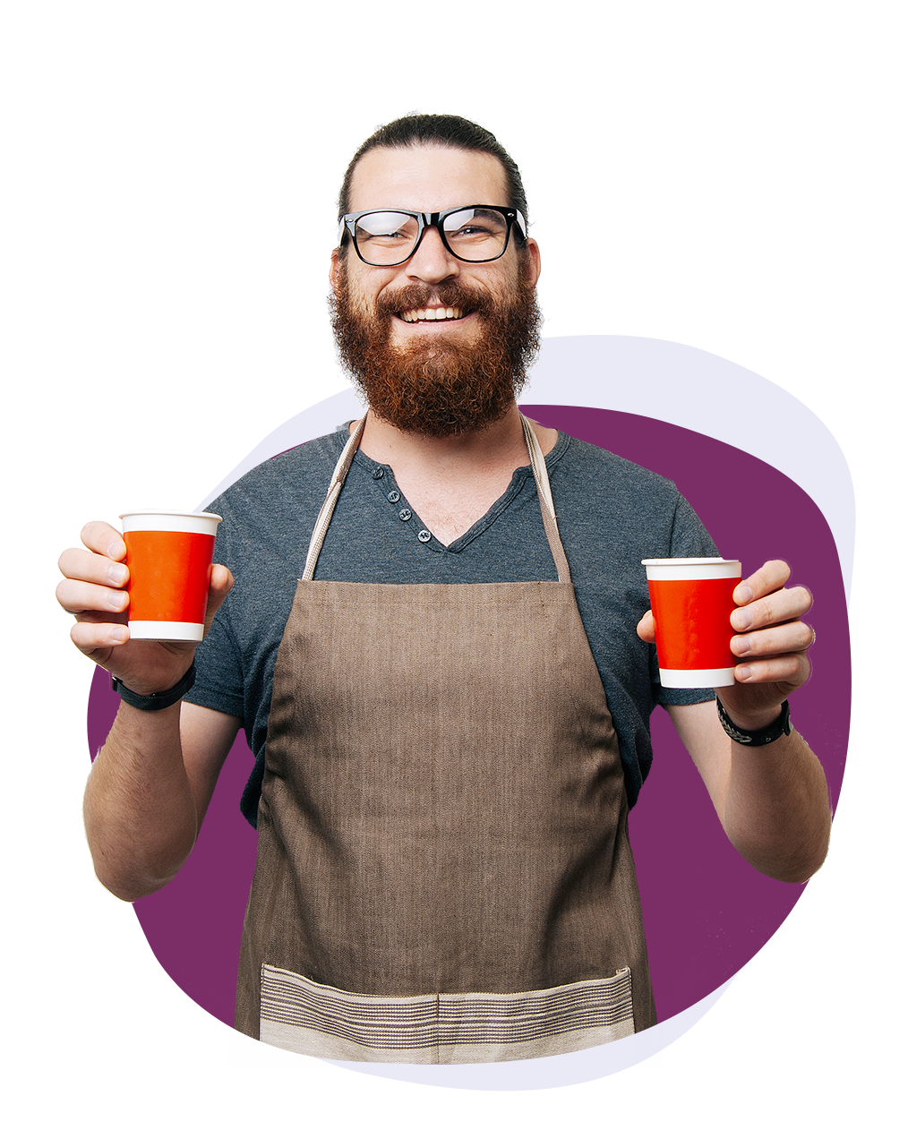 A man smiles while holding two red cups